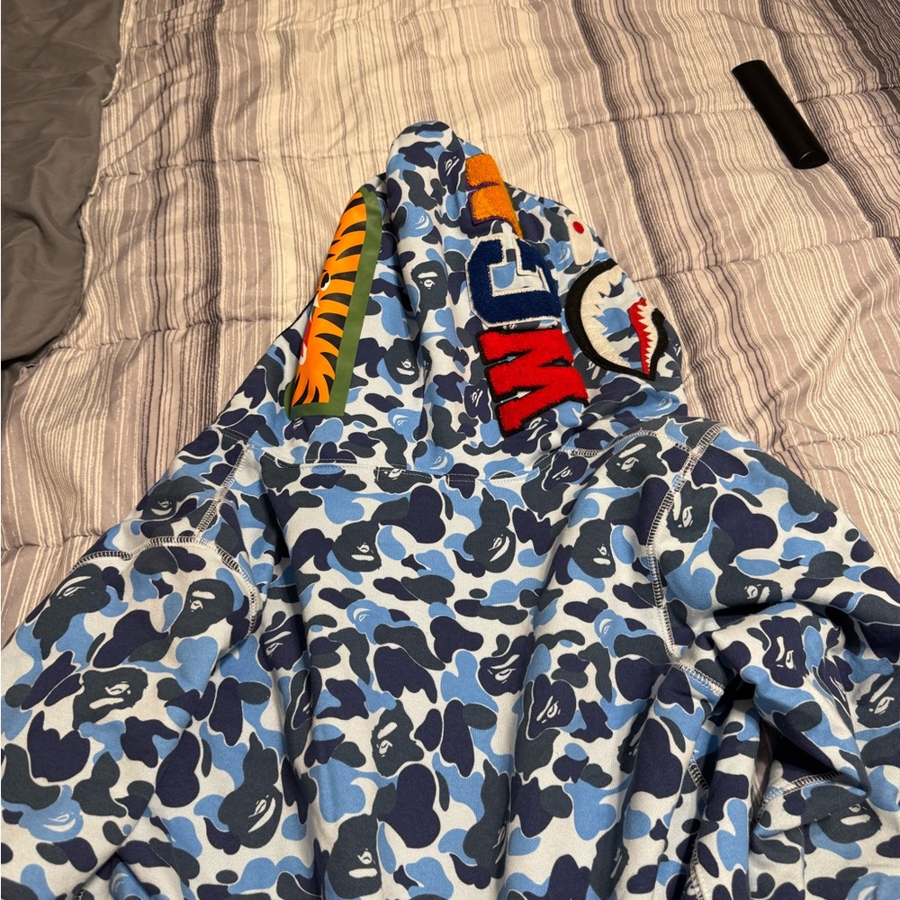 Blue Camouflage Hoodie with Colorful Patches